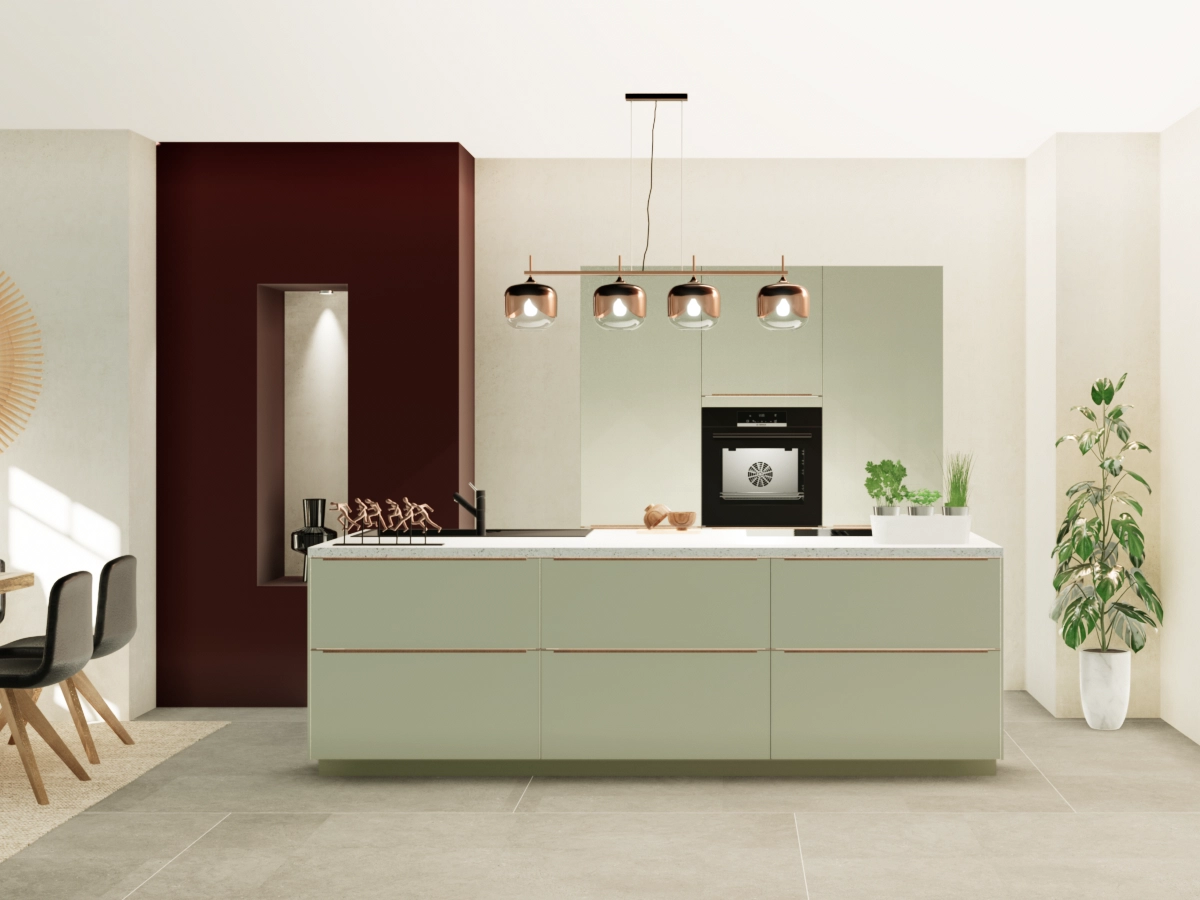 Die zentrale Kücheninsel lädt zum gemeinsamen Kochen und Genießen ein.