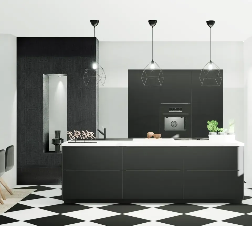 Foto von einem Induktionskochfeld mit Muldenlüfter und einer Pfanne mit Gemüse